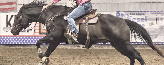 A rider running home after the third barrel