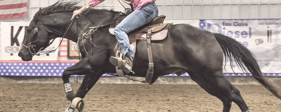 A rider running home after the third barrel